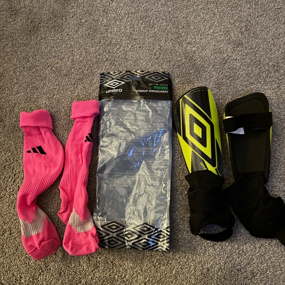 Adidas kids Metro Pink Athletic Socks and Umbro Kids Black Shin Guards